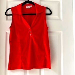 Sleeveless golf shirt.